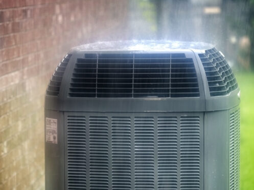 An air conditioner during a rain storm